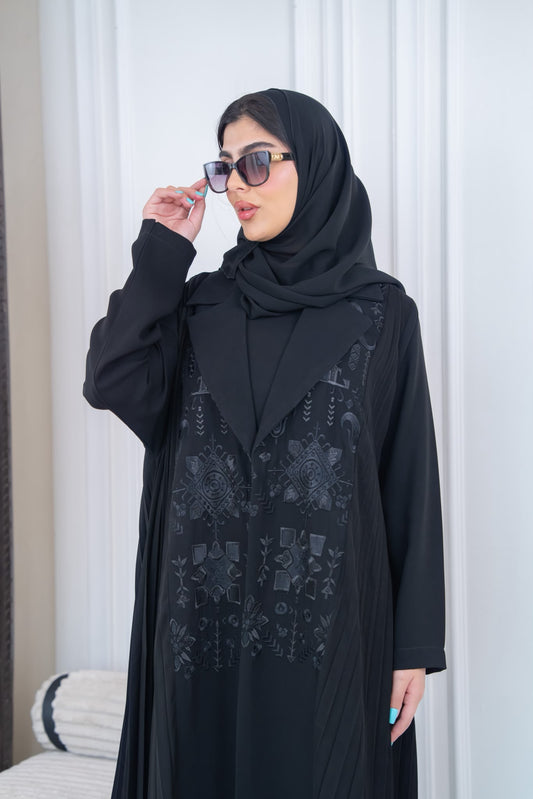 Black pleated crepe abaya with embroidery.C:1115