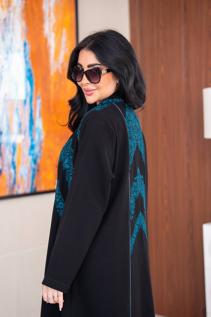 Black crepe abaya with blue embroidery.C;1045