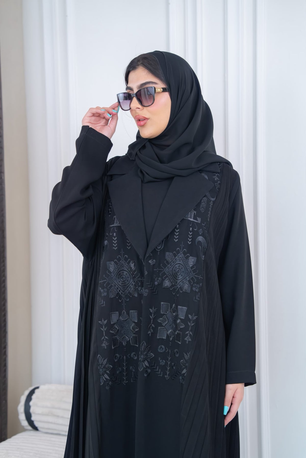 Black pleated crepe abaya with embroidery.C:1115
