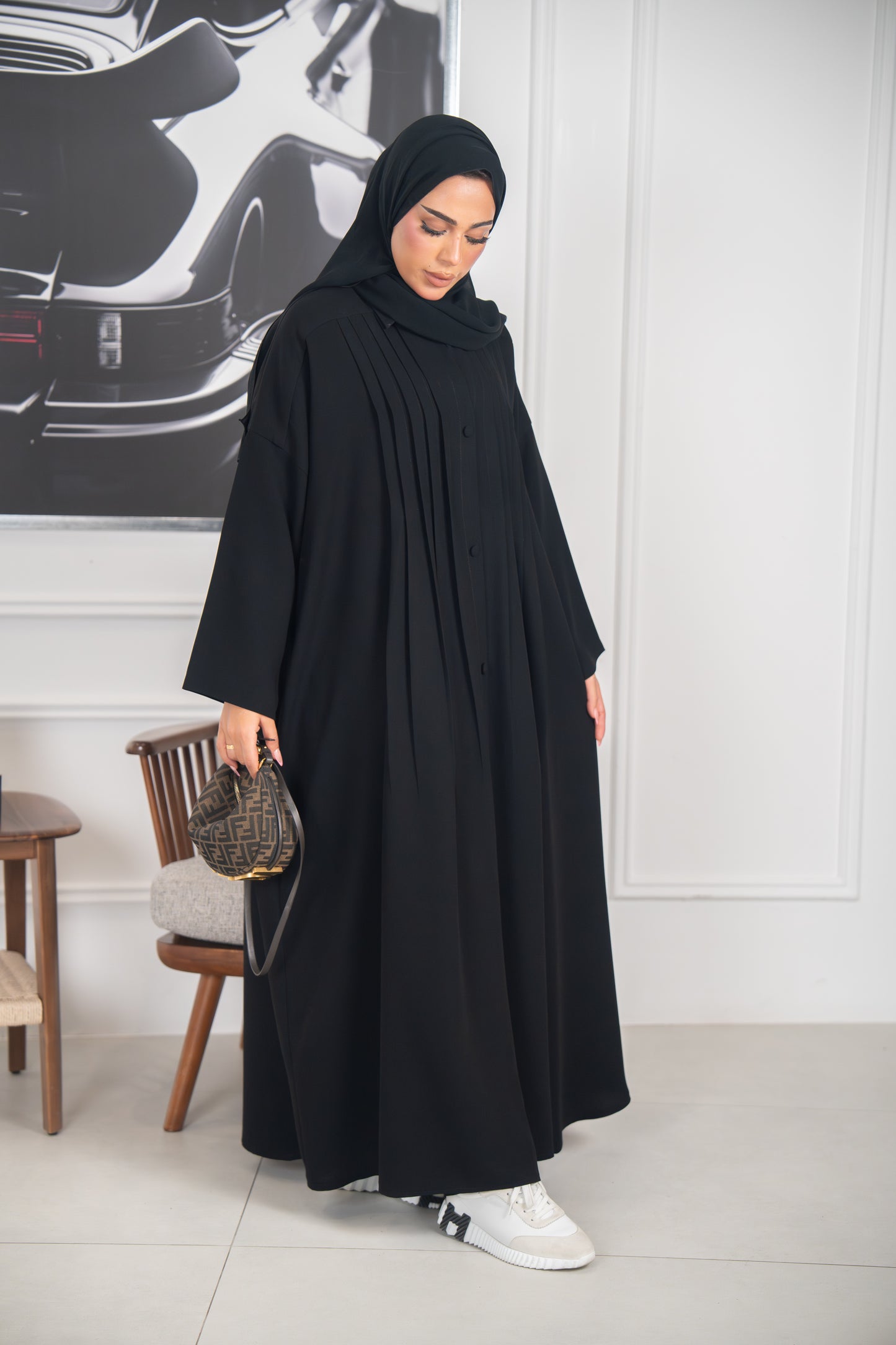 عباية الطايرة - أناقة مطوية في الحركة