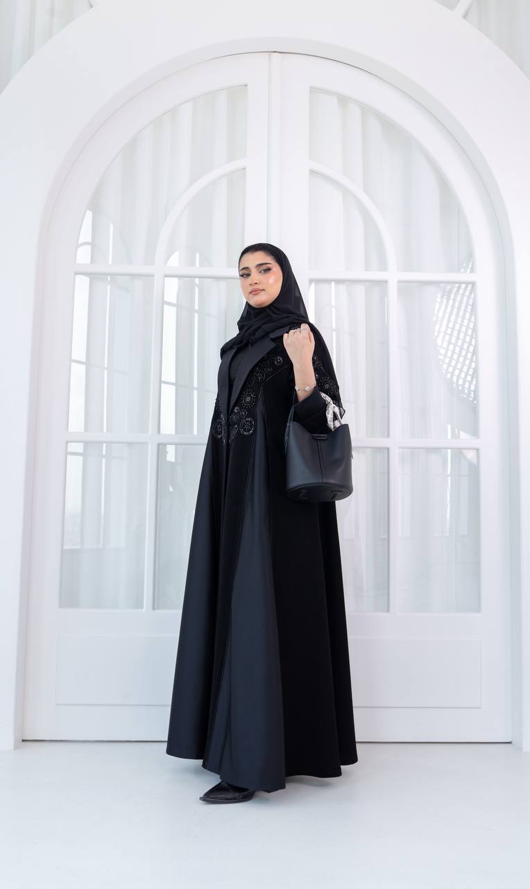 Crepe abaya with satin and hand-beaded details.C:1080