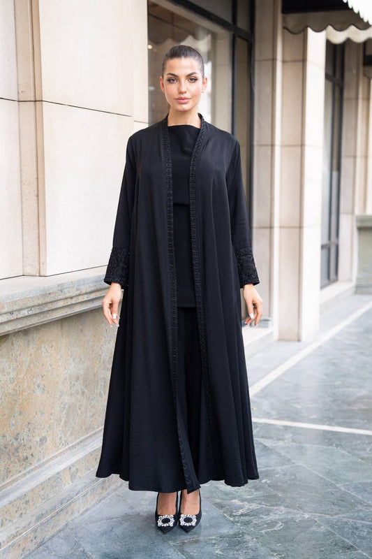 Linen abaya in black with hand embroidery and beading. C:1089