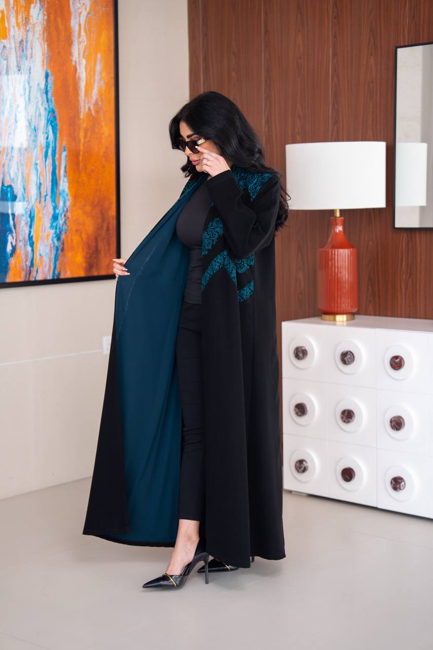 Black crepe abaya with blue embroidery.C;1045