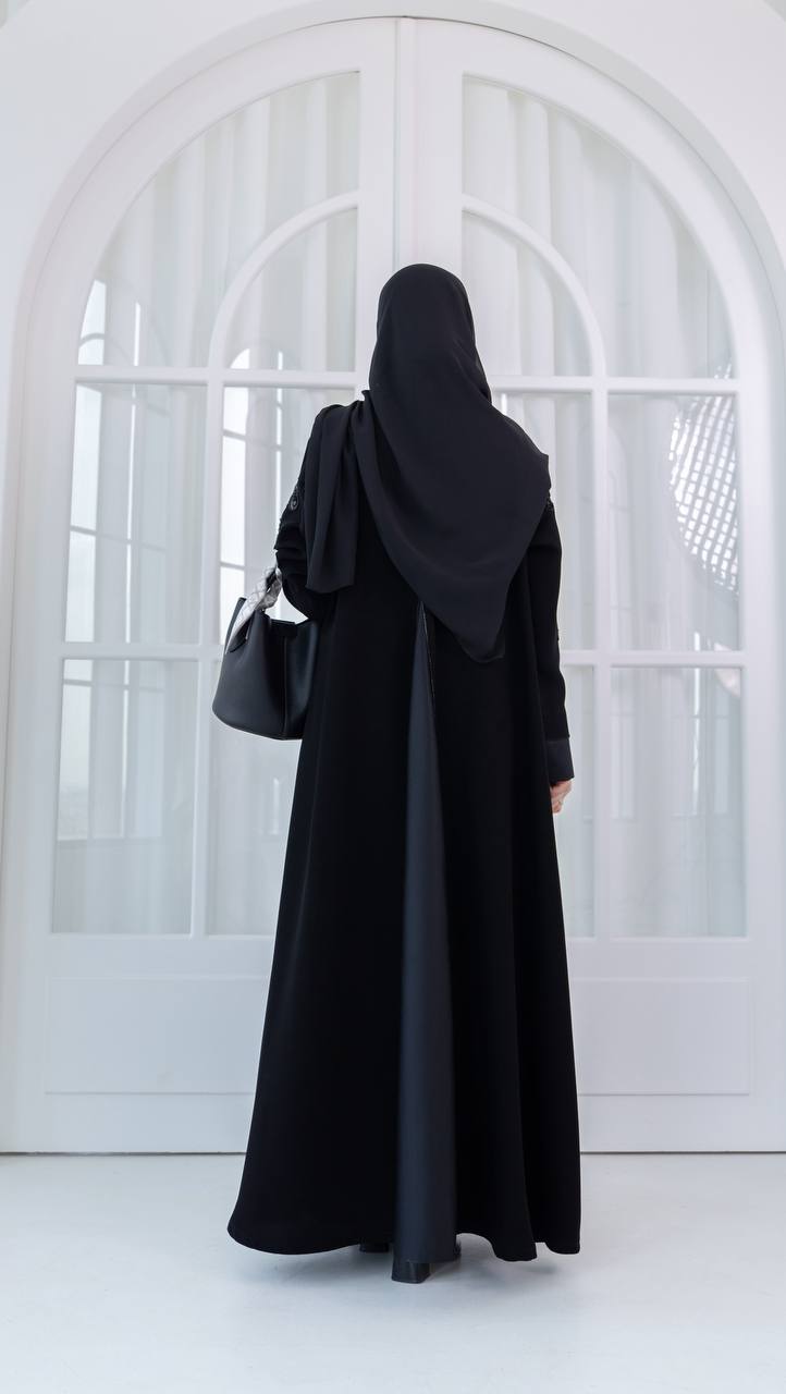Crepe abaya with satin and hand-beaded details.C:1080