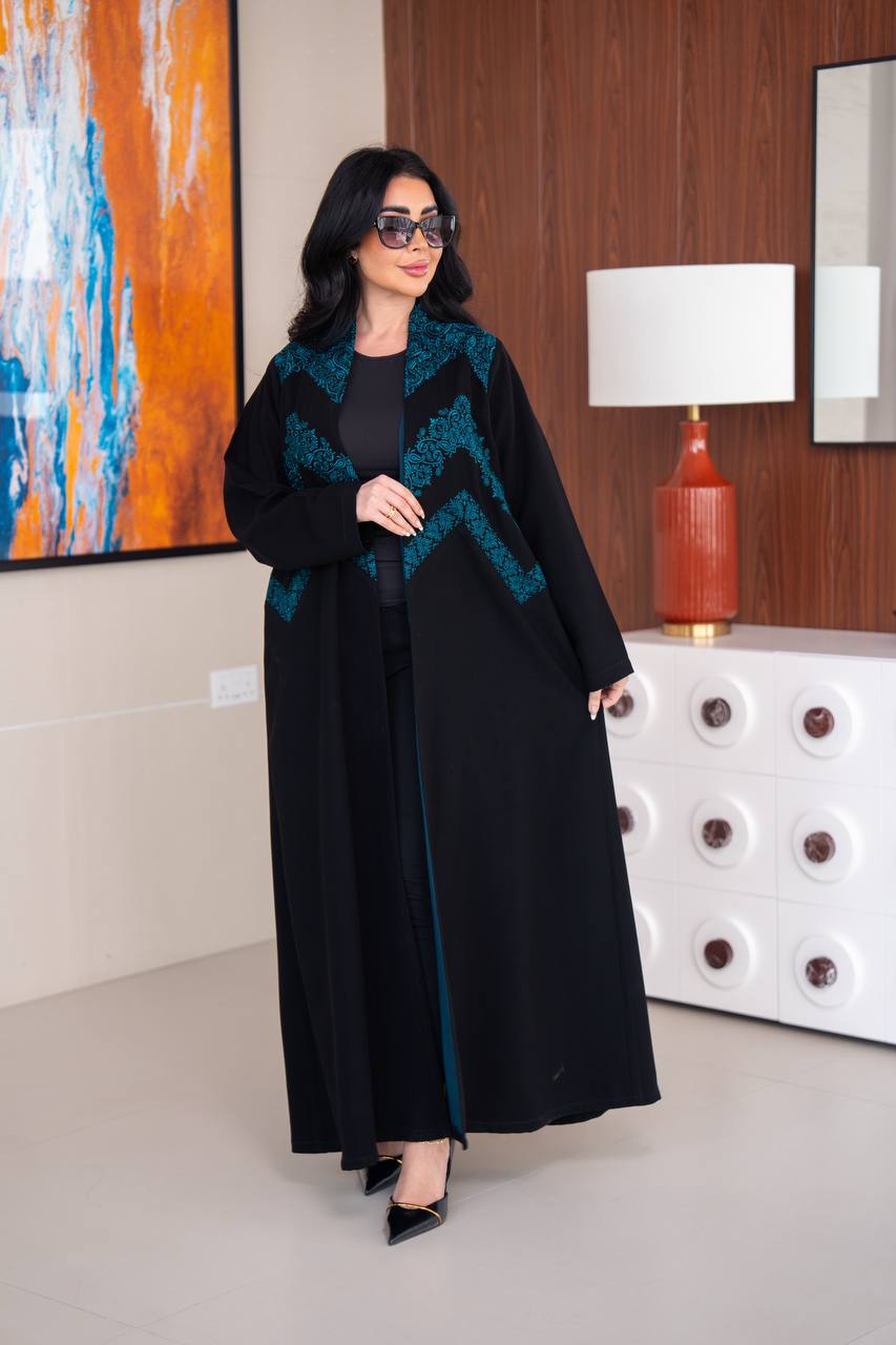 Black crepe abaya with blue embroidery.C;1045
