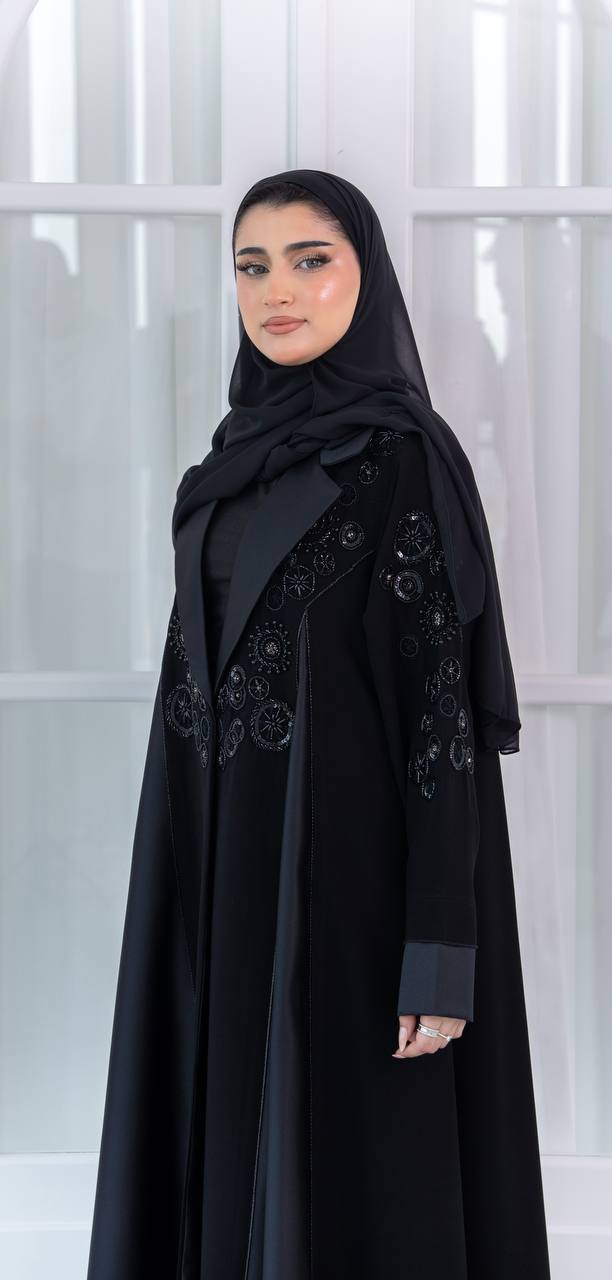 Crepe abaya with satin and hand-beaded details.C:1080