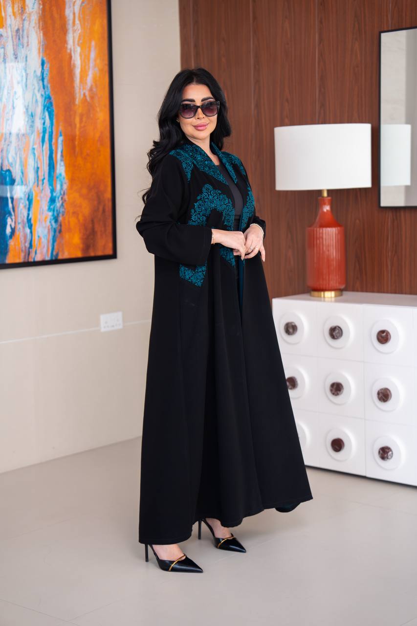 Black crepe abaya with blue embroidery.C;1045