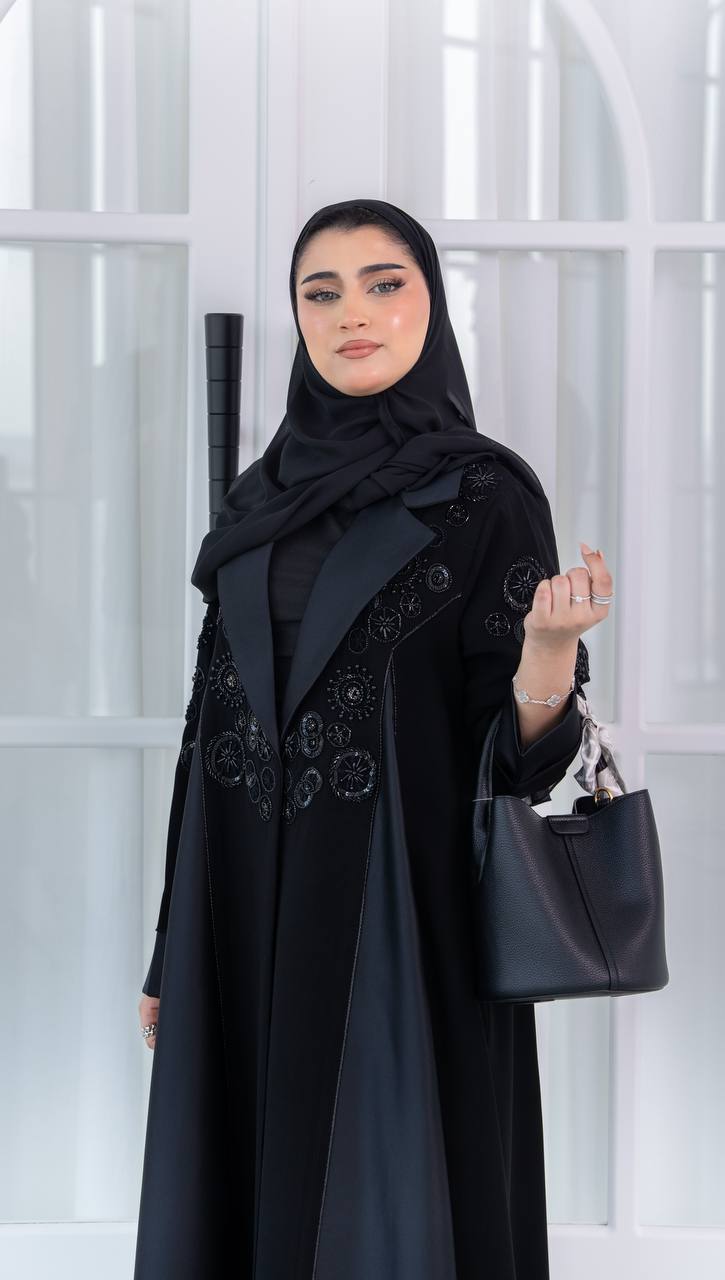 Crepe abaya with satin and hand-beaded details.C:1080