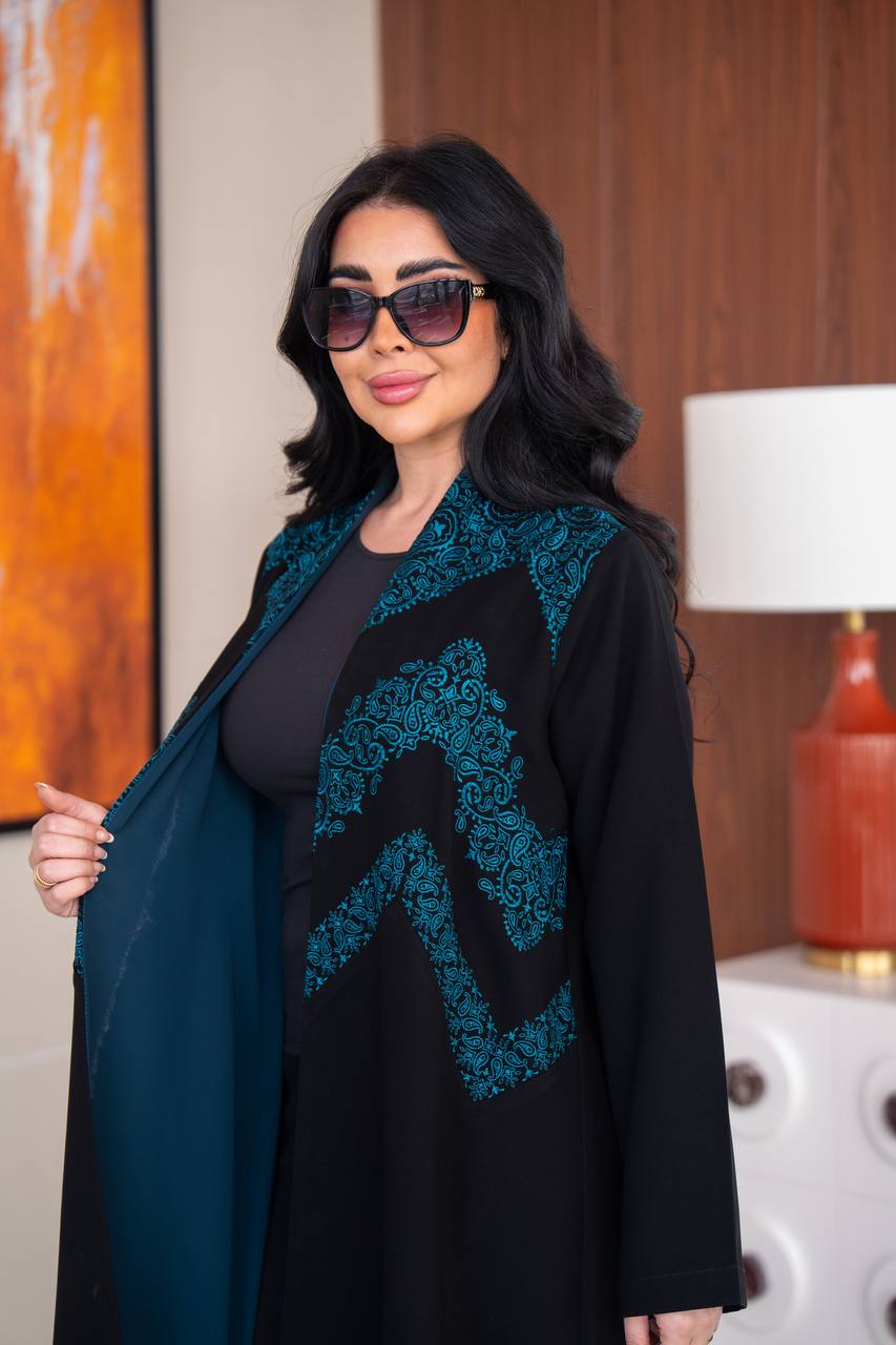 Black crepe abaya with blue embroidery.C;1045