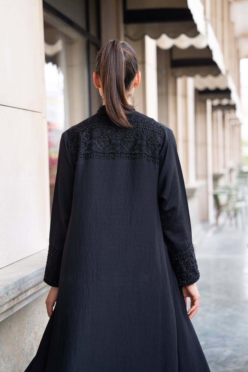 Linen abaya in black with hand embroidery and beading. C:1089