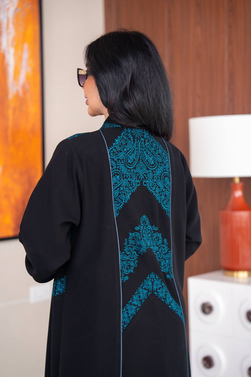 Black crepe abaya with blue embroidery.C;1045