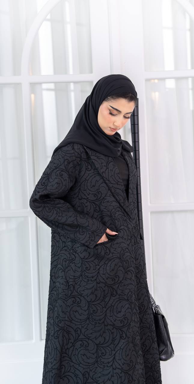 عباية بليزر بخام الجاكار باللون الاسود . C:1085 